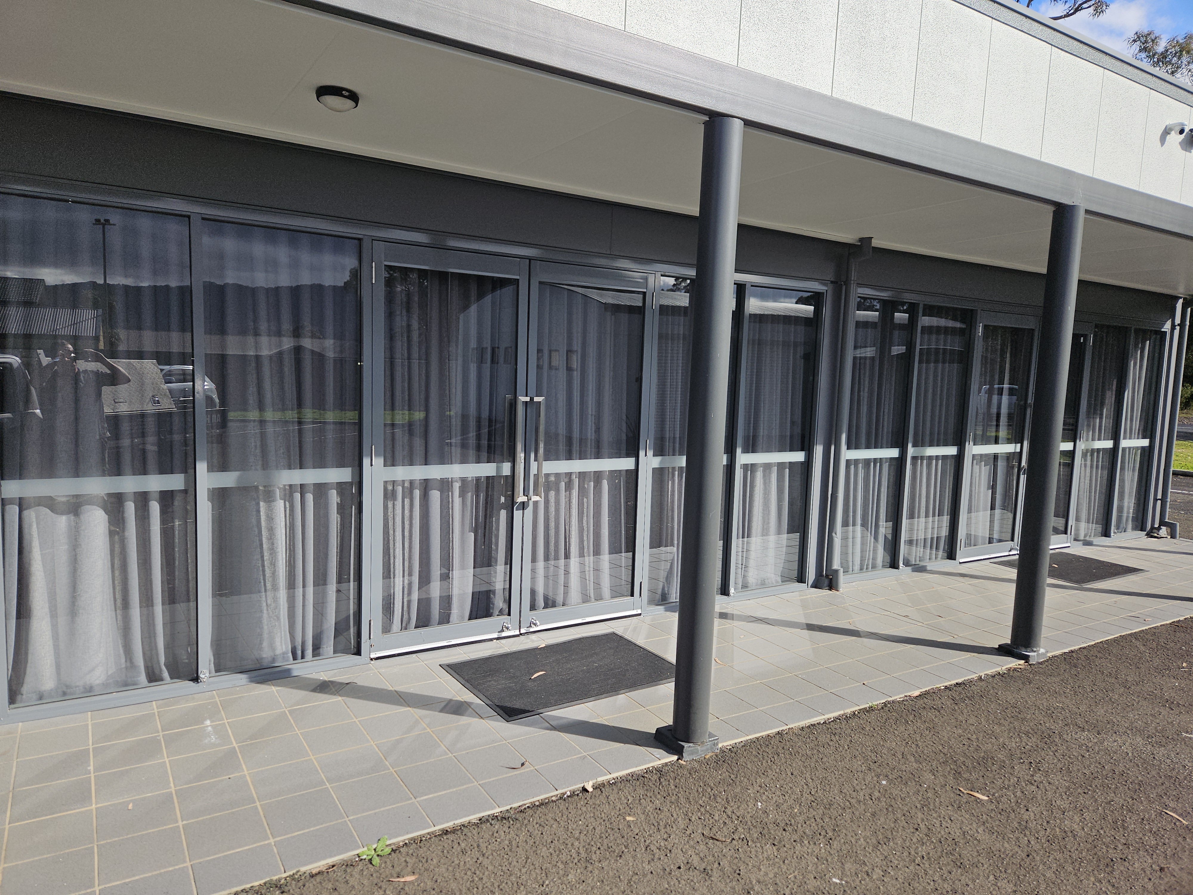 Commercial shopfront glazing with full-height glass panels installed by All Hours Glass